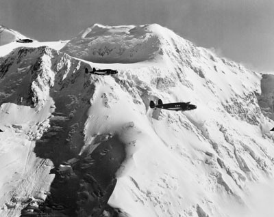 [RX1-13-17816] Postcard U.S. A-29S Flying Over The Mountains Alaska